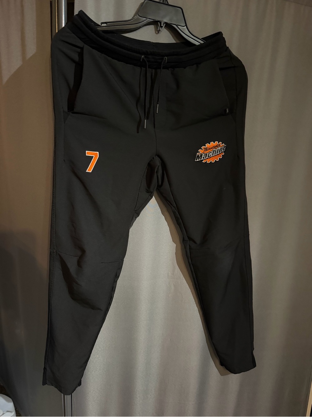 UNRL Black Joggers with Orange Minnesota Machine Logo and Accents
